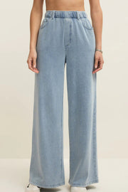 light blue wide leg denim pants with elastic waistband and front pockets, front view