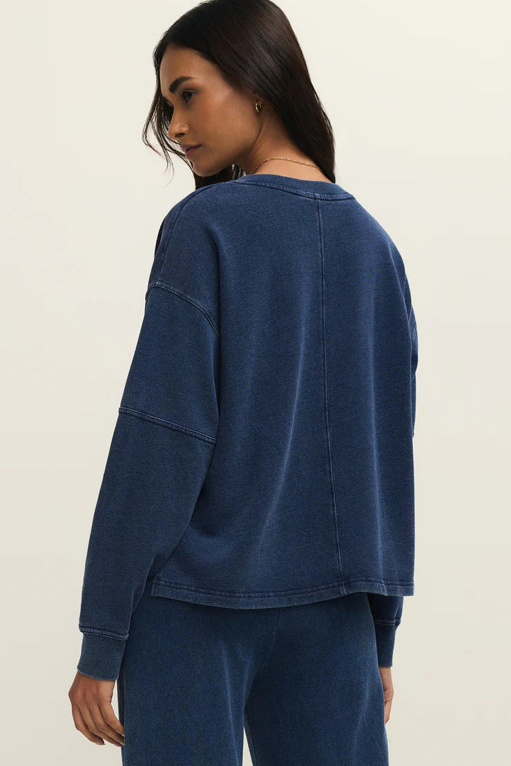 back view of indigo v neck sweatshirt