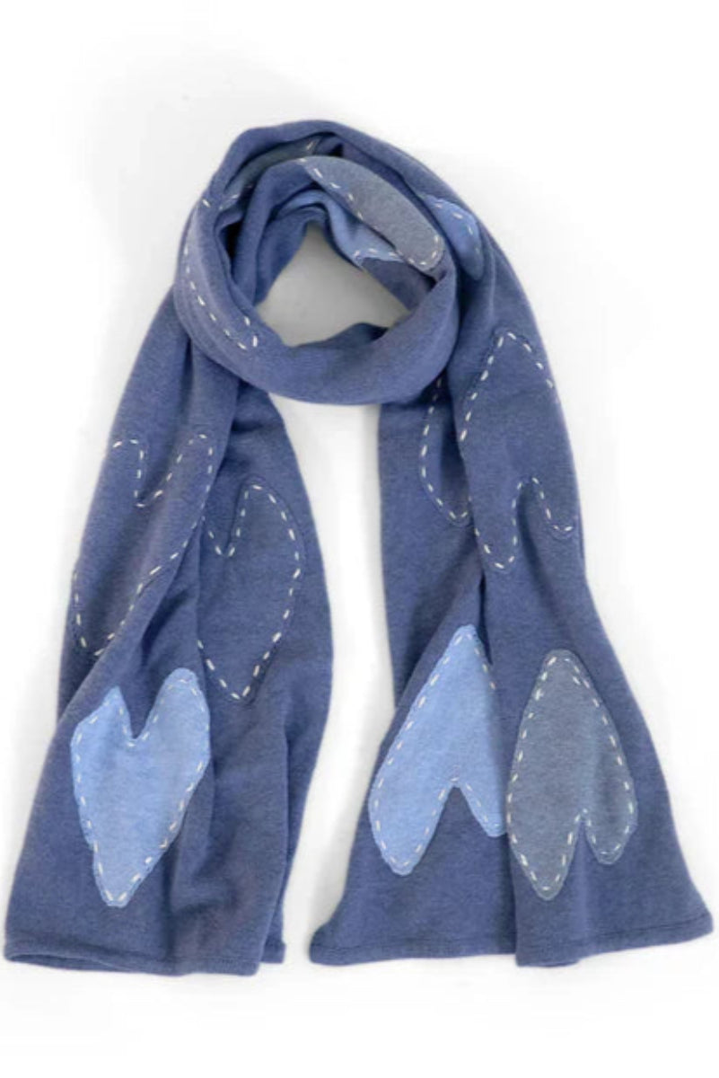Blue scarf with imperfect heart patches and whipstitch detailing all over