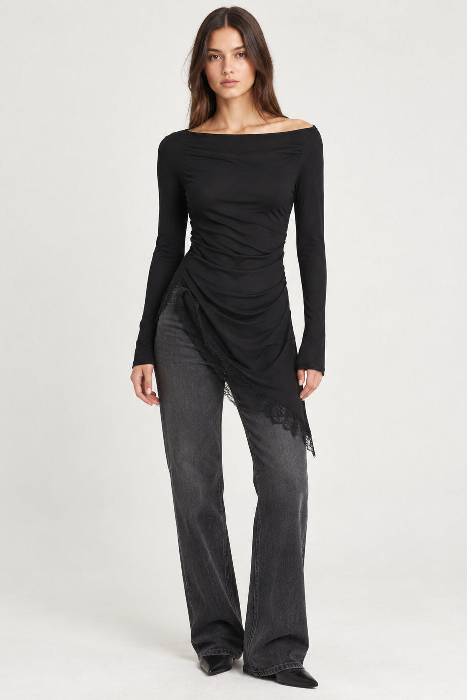 woman wearing off the shoulder rushed black fitted top 