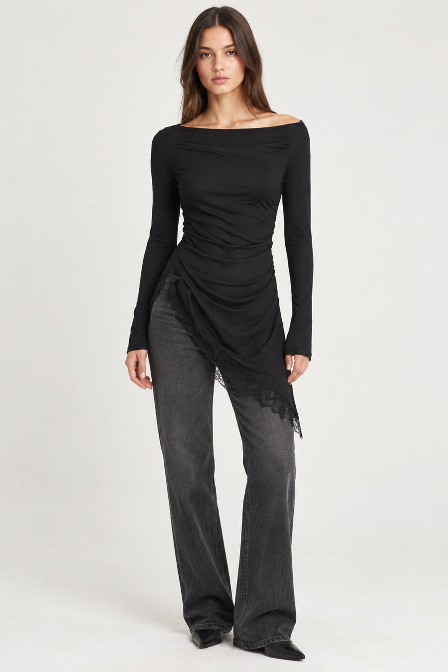 woman wearing off the shoulder rushed black fitted top 