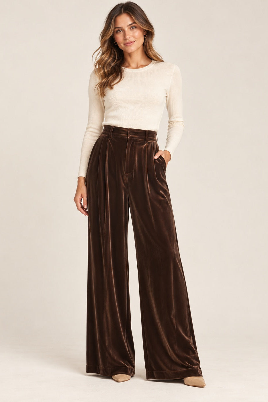 woman wearing kwon high waisted flared velvet pants 