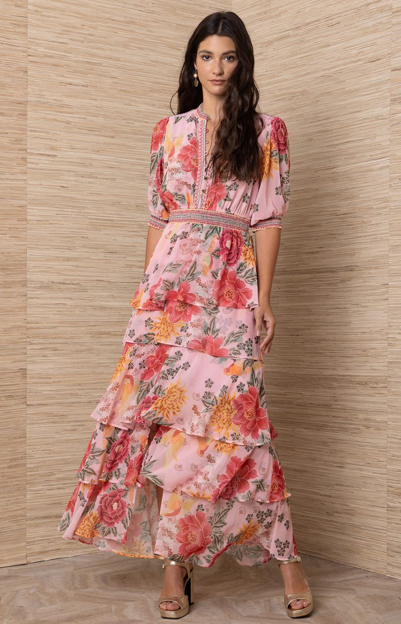 Woman wearing a floral dress.
