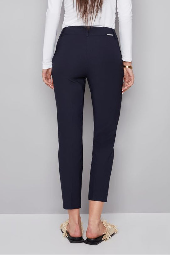 woman wearing a navy blue ankle pant