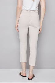 woman wearing an ankle length beige stripped pants