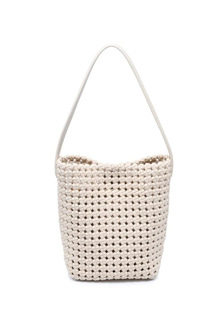 Cream woven shoulder bag with a structured bucket silhouette, open basket weave texture, and slim shoulder strap, front