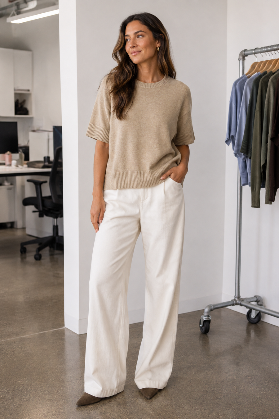 woman wearing a beige knit short sleeve sweater 
