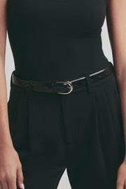 woman wearing a black belt