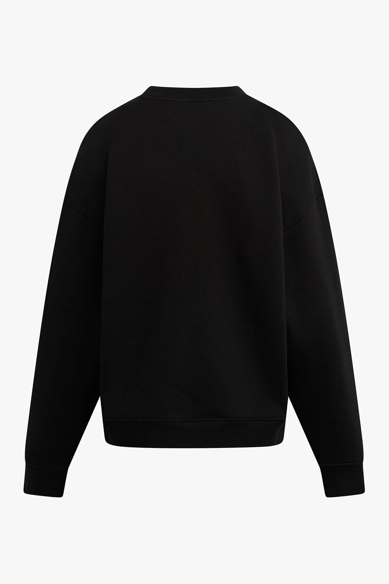 Woman wearing a black long-sleeve crewneck sweatshirt with “FAVORITE DAUGHTER” graphic text, back