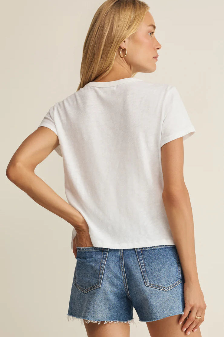 Woman wearing a white crewneck short-sleeve T-shirt, back