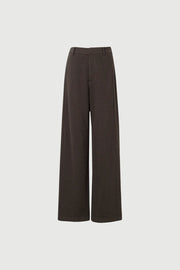 Woman wearing dark brown high-waisted wide-leg trousers, front