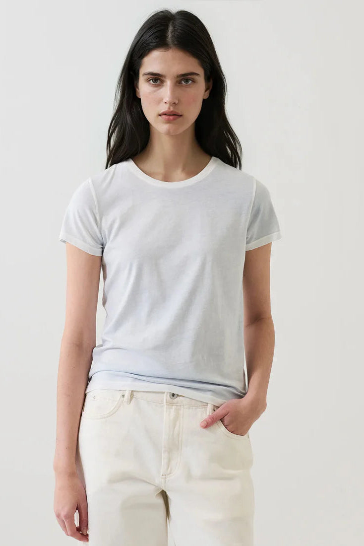 woman wearing a slight blue tee shirt
