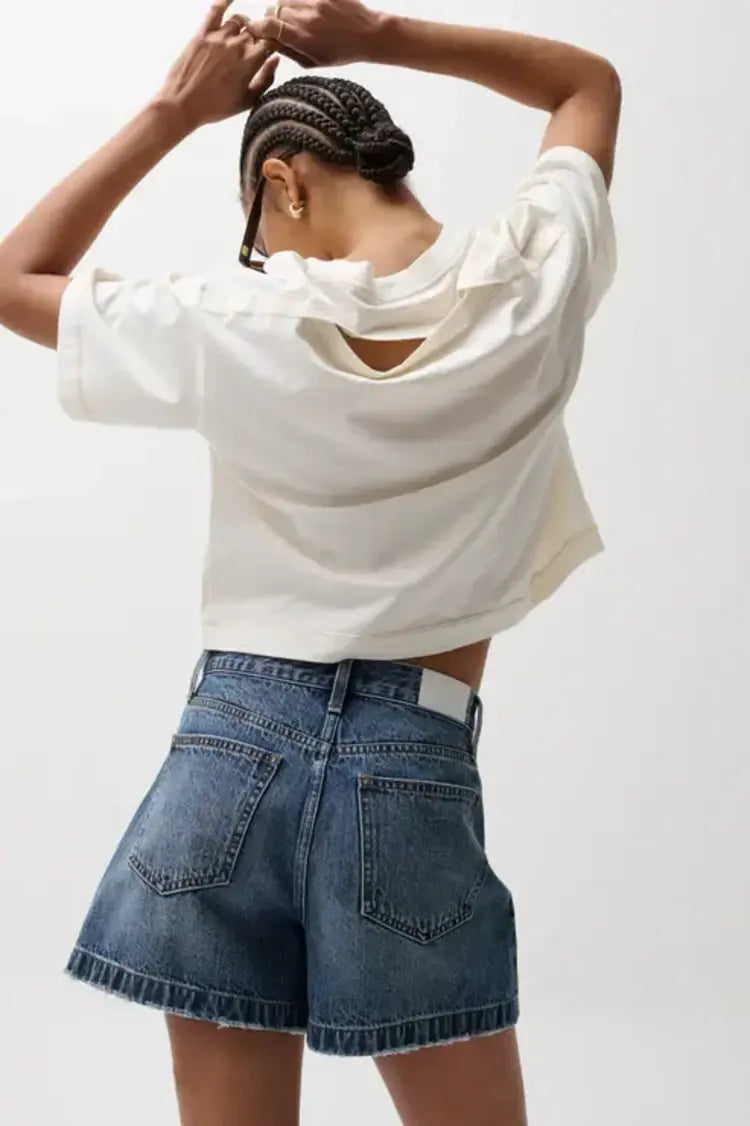 back view of a rise denim shorts