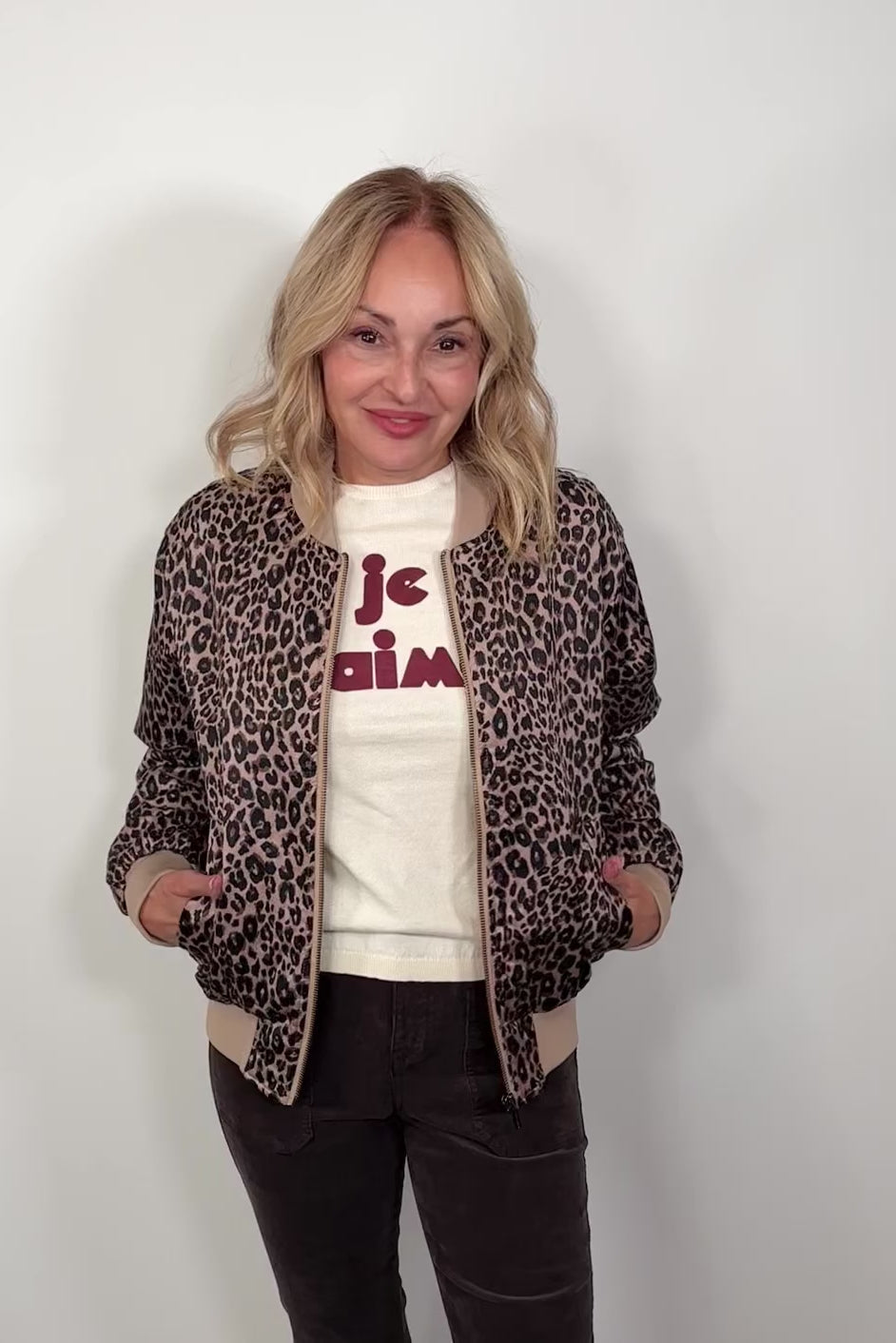 Video of a leopard print bomber jacket 