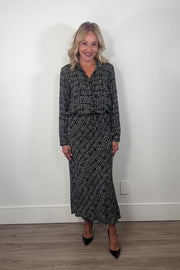 video of a woman wearing a printed maxi skirt