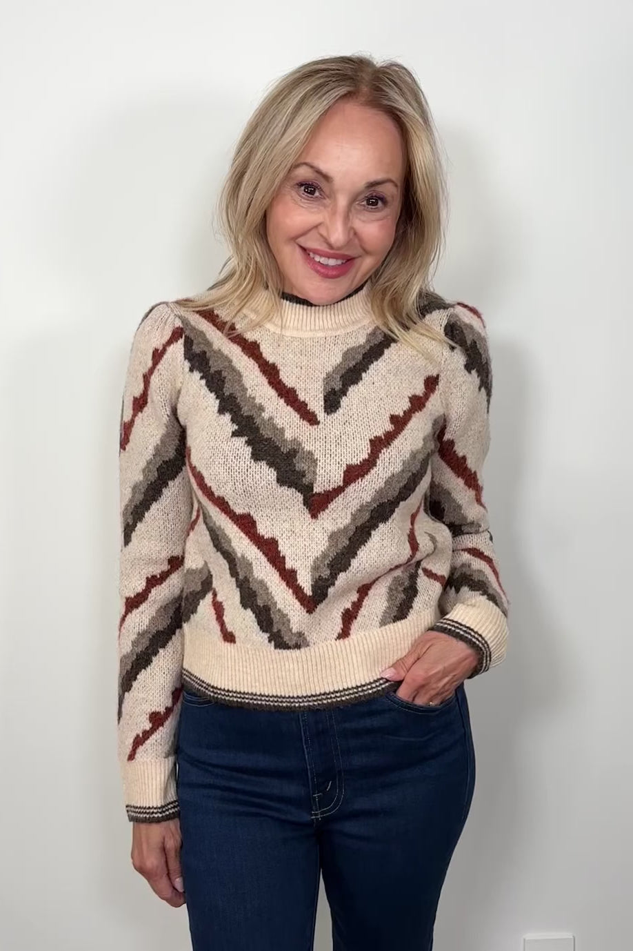 Video of woman wearing a jacquard pattern sweater