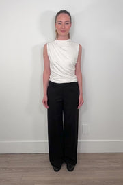 Video of woman wearing a black wide leg ponte pant