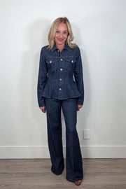 woman wearing a denim top with matching wide leg blue jeans