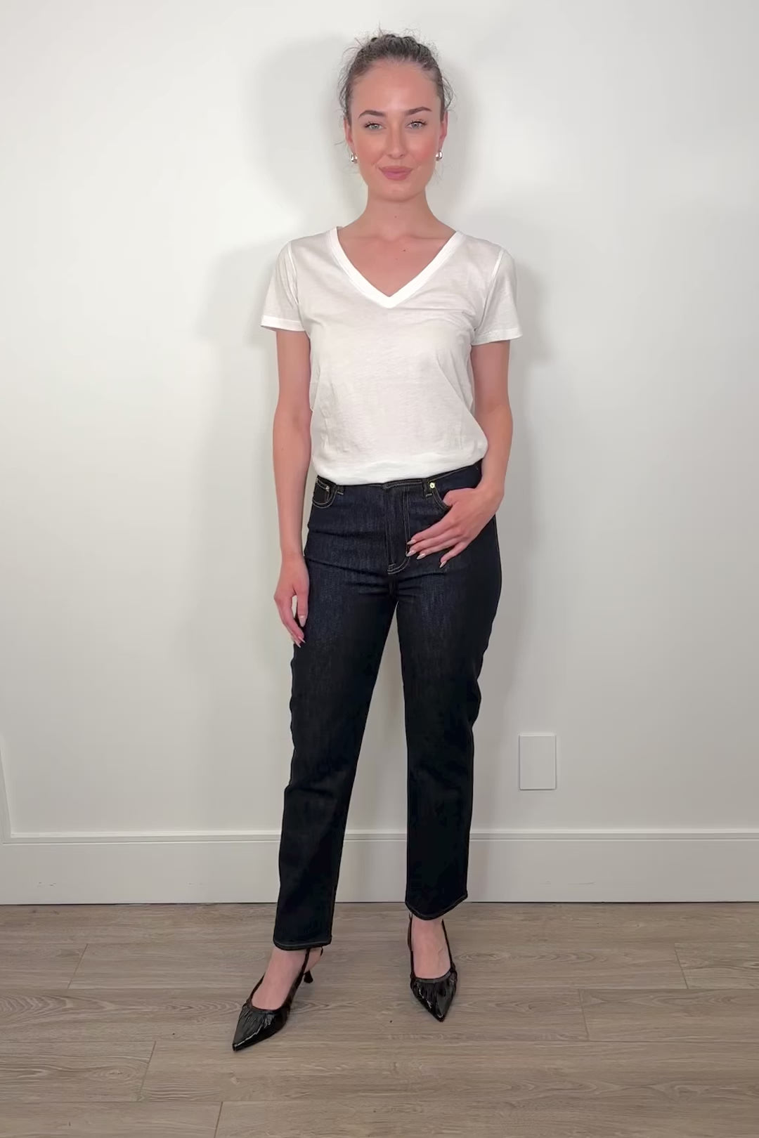 video of a woman wearing dark wash straight keg crop jean