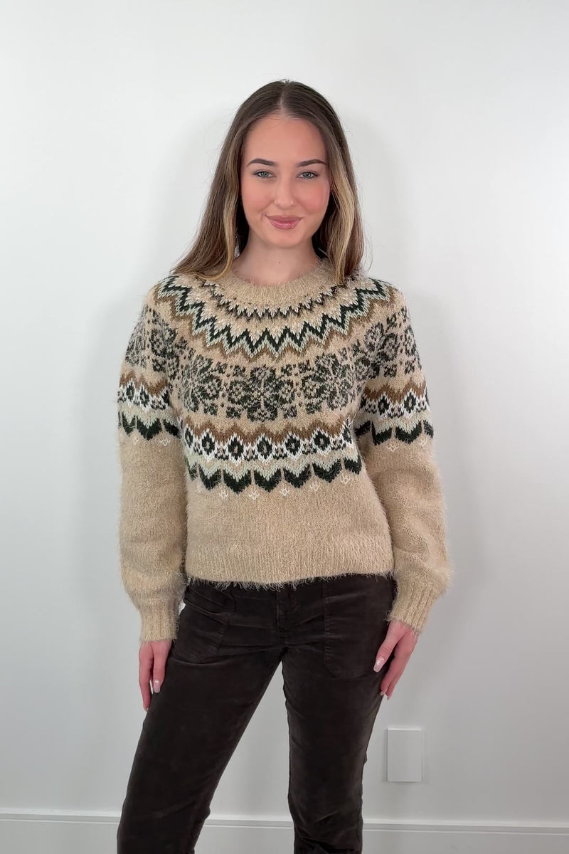 video of woman wearing a patterned sweater