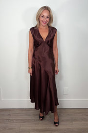 Video of a woman wearing a chocolate brown satin dress