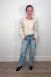 Video of woman wearing blue denim jeans with silver studs