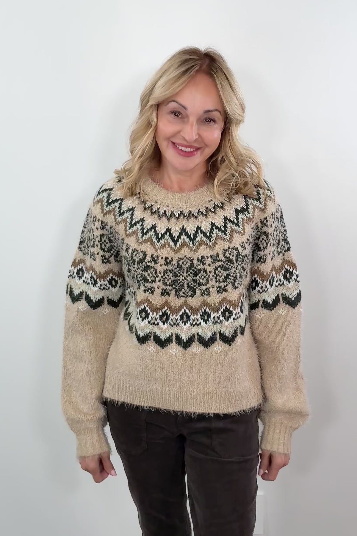 video of woman wearing a patterned sweater