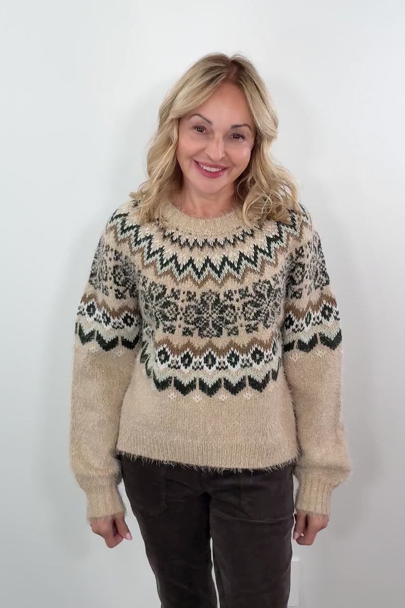 video of woman wearing a patterned sweater