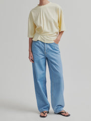 Butter yellow top with twist detail and wide sleeves