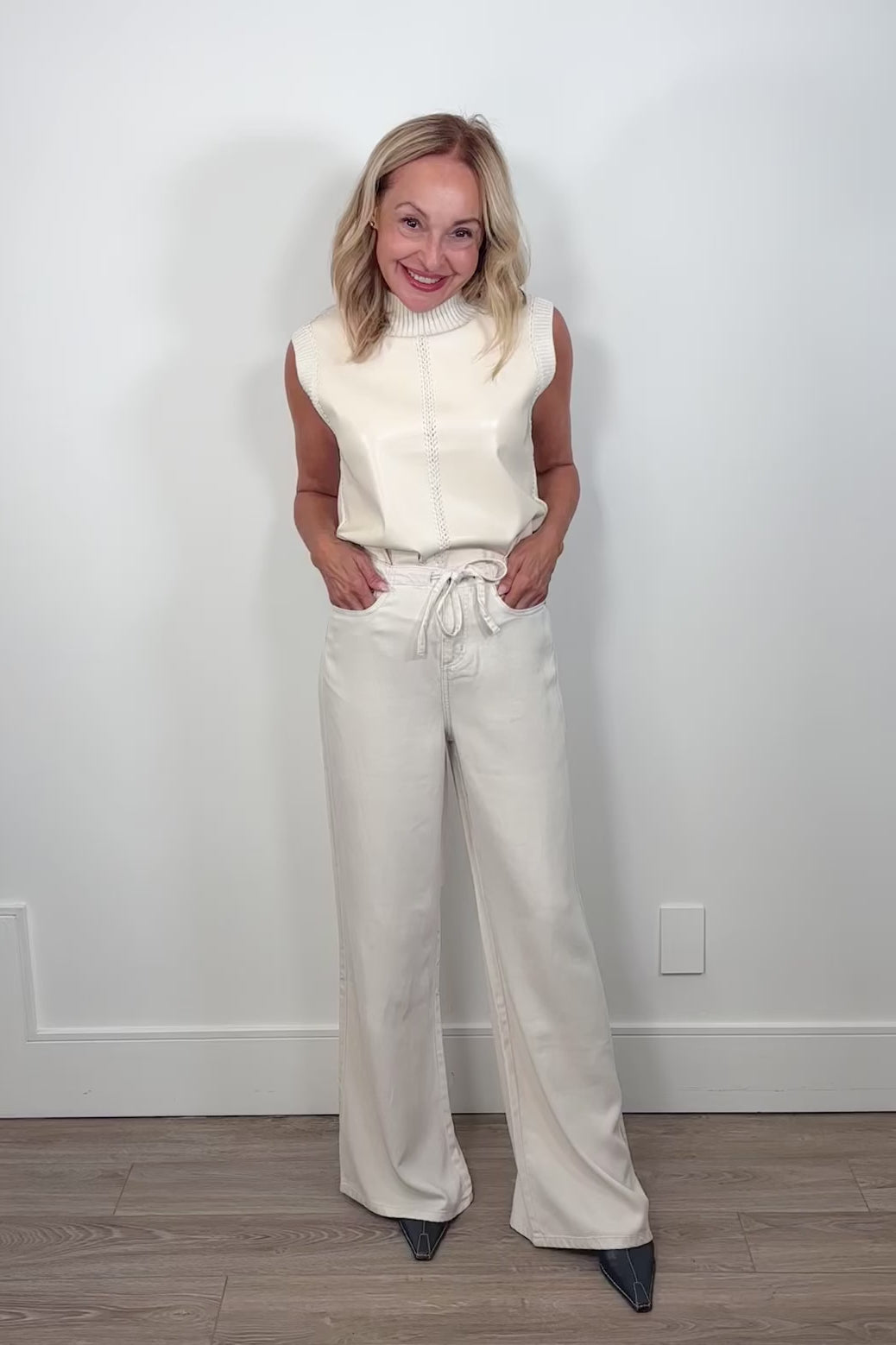 video of a woman wearing a white denim pant