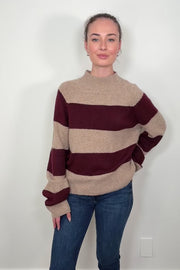 Video of a woman wearing a Sweater with burgundy stripes 
