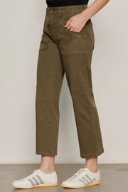 Woman wearing olive green cropped utility pants with a relaxed straight-leg silhouette. Features a high-rise waist, button and zip closure, oversized front patch pockets, and utility-inspired seam detailing. Crafted from soft stretch twill for everyday comfort and ease of movement, side