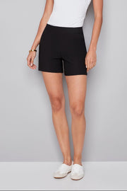 woman wearing black pull on shorts