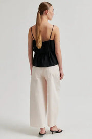 Black ruffled camisole with spaghetti straps 
