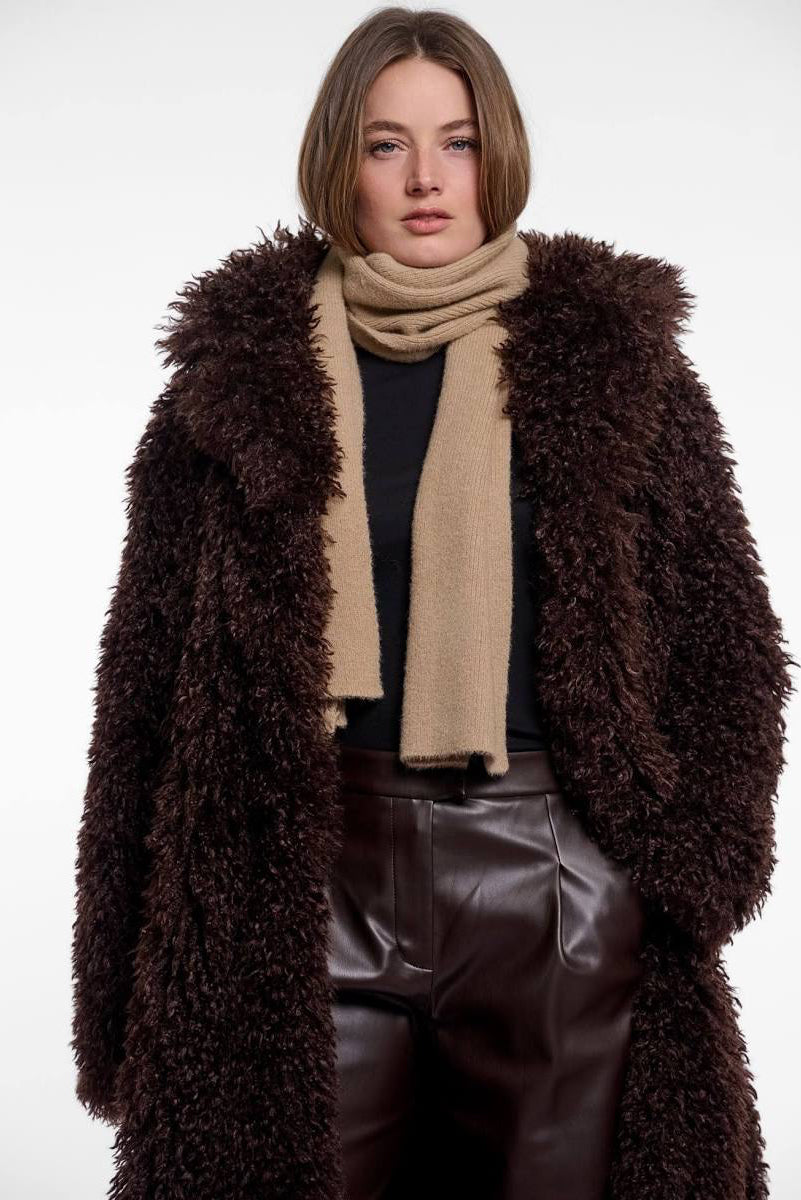 woman  wearing brown full length faux fur dark brown coat