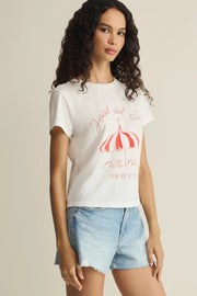 Woman wearing a white short-sleeve graphic T-shirt with red print, front