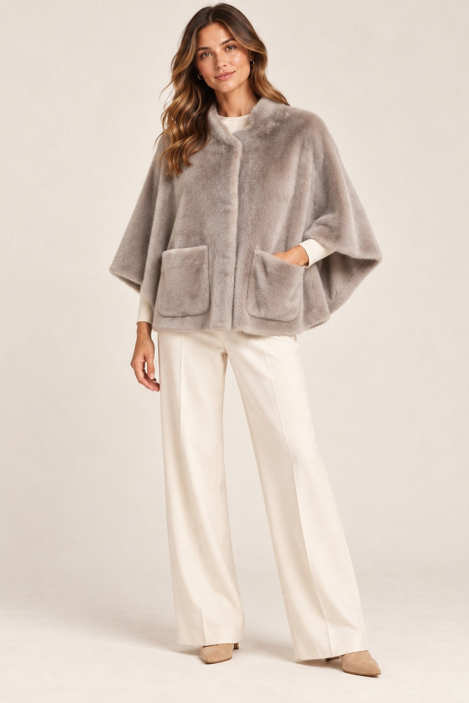 woman wearing fur cover up oversized jacket 