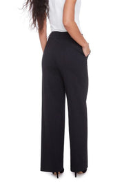 Back view of woman wearing black pinstriped ponte pants
