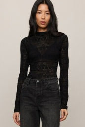 black long sleeve sheer patterned tight fit top. 