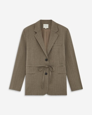 A taupe-brown textured blazer with a tie waist and two front flap pockets, displayed flat against a light gray background.