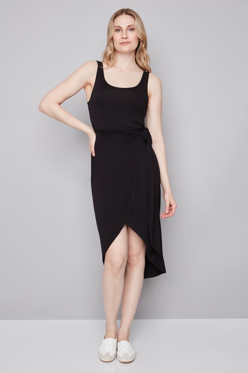 woman wearing a black midi dress with bow detailing n the side