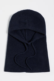 woman wearing navy knitted baclava 