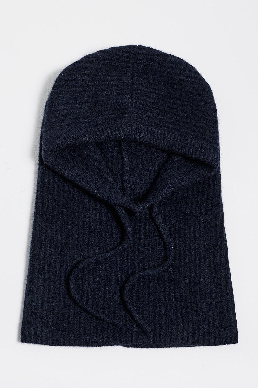 woman wearing navy knitted baclava 