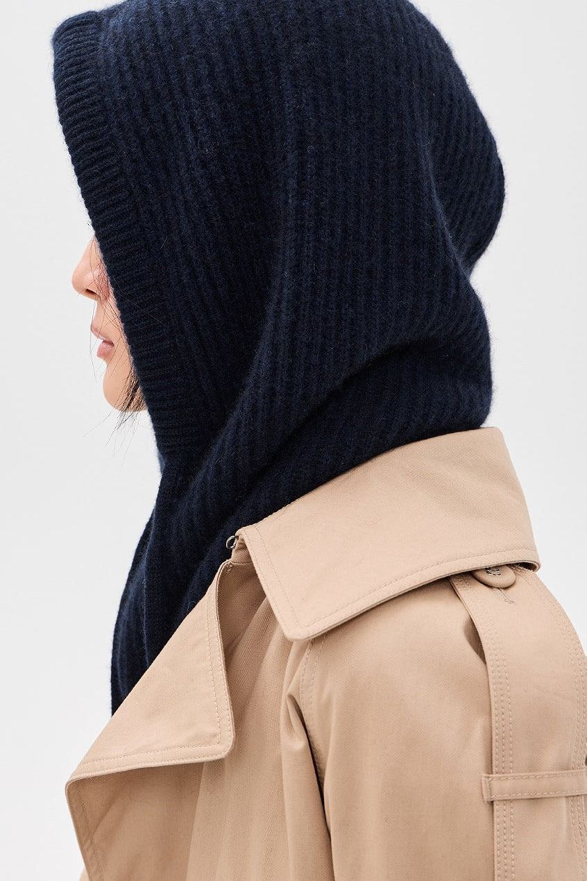 woman wearing navy knitted baclava 