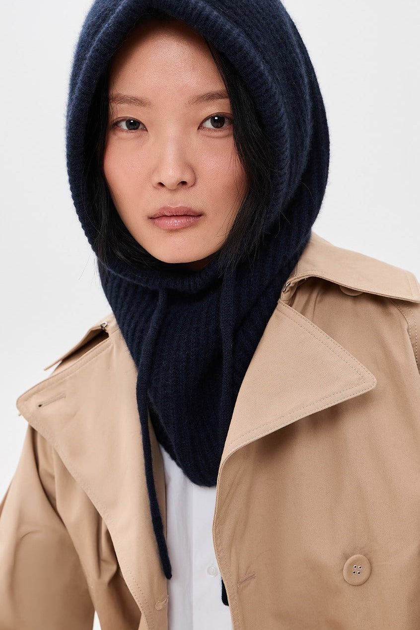 woman wearing navy knitted baclava 