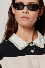 close up of embellished polo collar